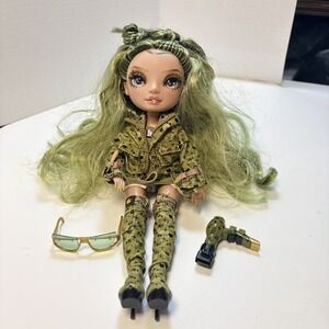 Rainbow High Description Olivia- Camo Green Fashion Doll. Fashionable Doll 2023